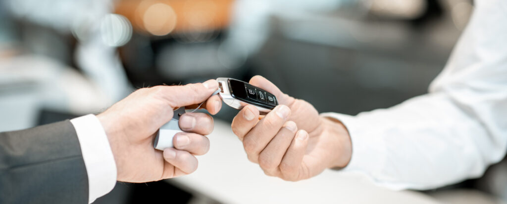car key handover 1920x774px